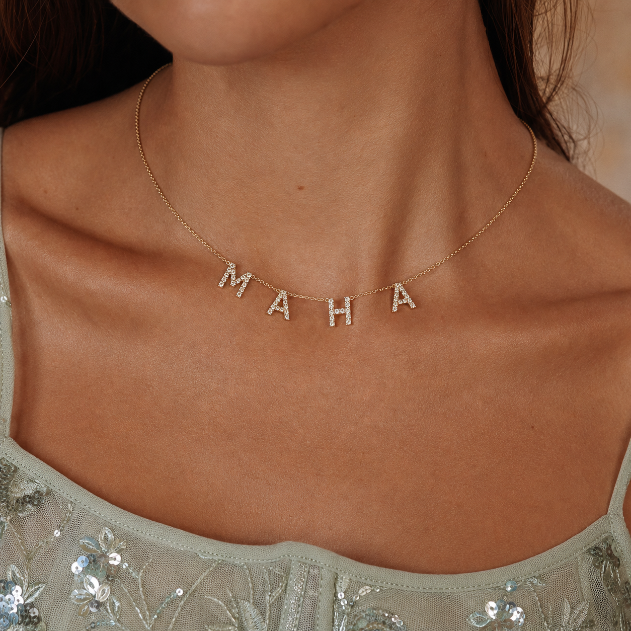 Personalized letter necklace on model