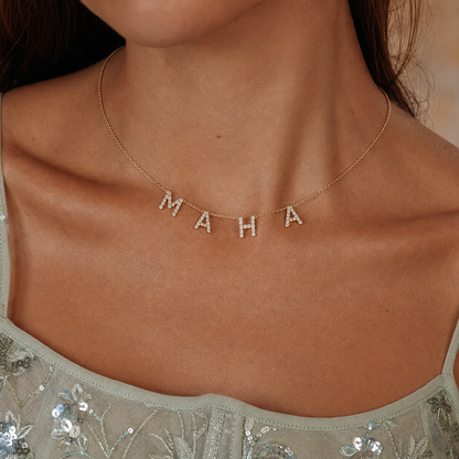 Personalized letter necklace on model